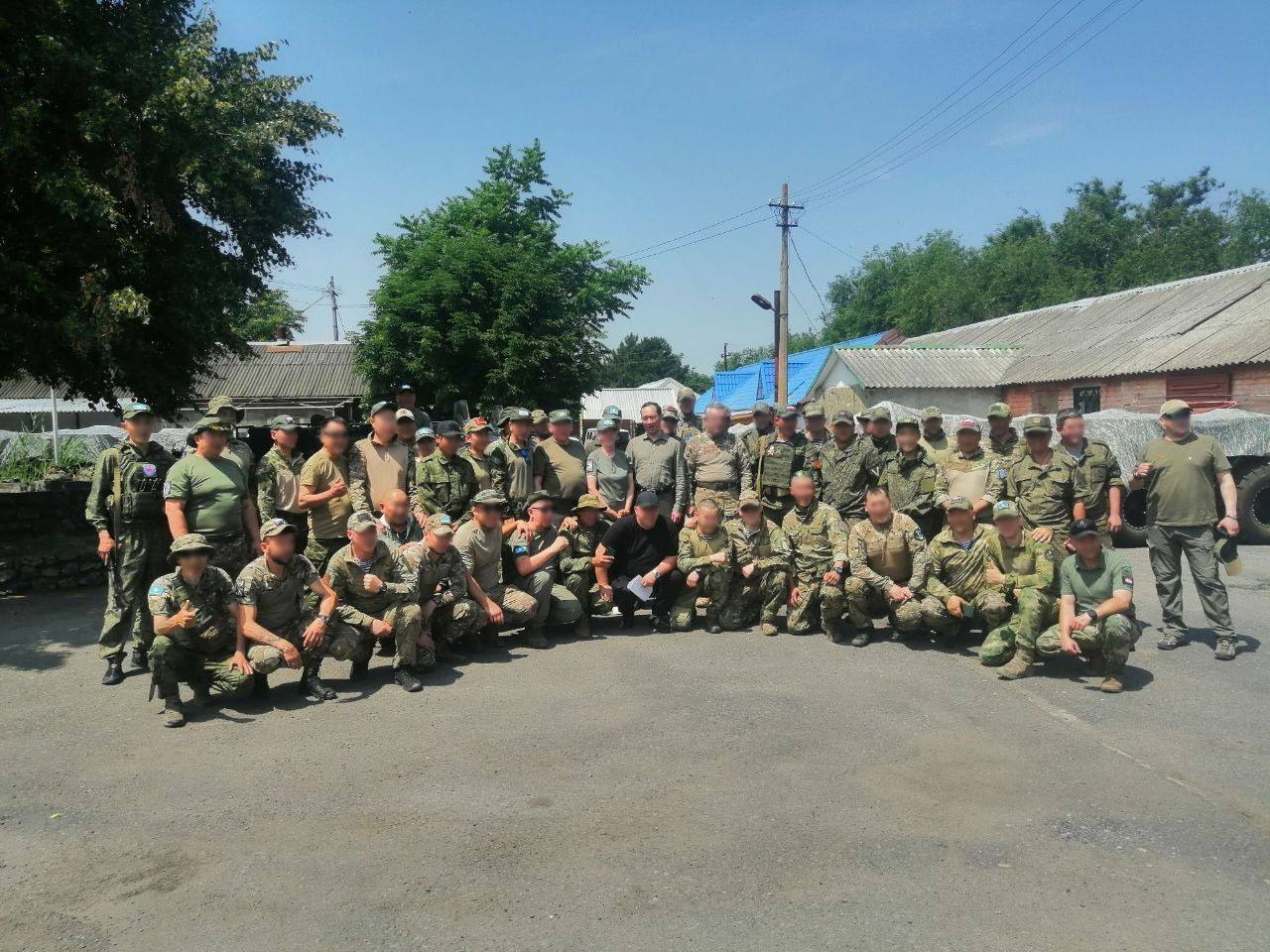 Глава Якутии Айсен Николаев с бойцами из Якутии в зоне проведения спецоперации