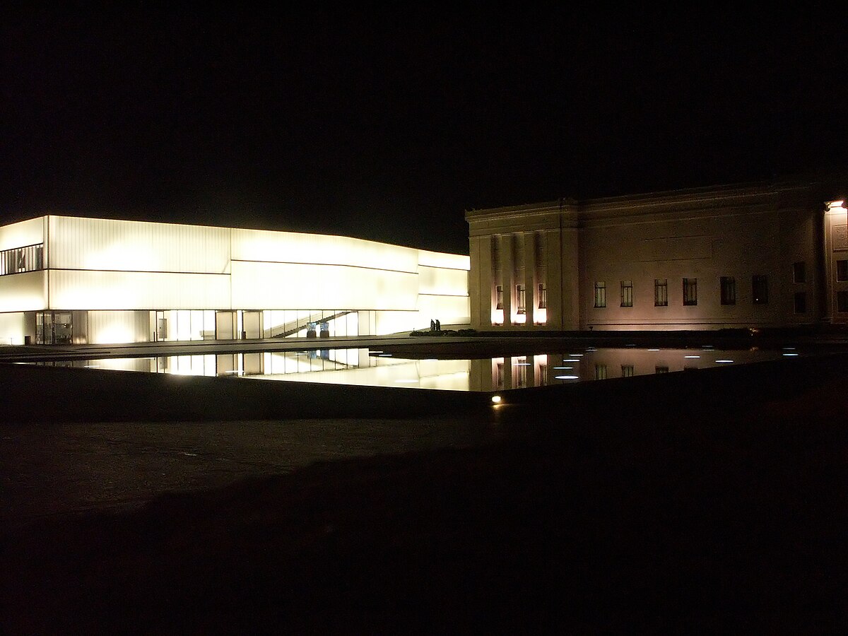 Nelson Art Gallery Bloch Building at night with the new «lens» addition.